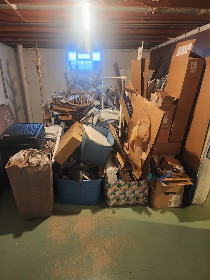 Roll-off dumpster container at job site for 4 Yard Dumpster Rental in Ocean Pointe